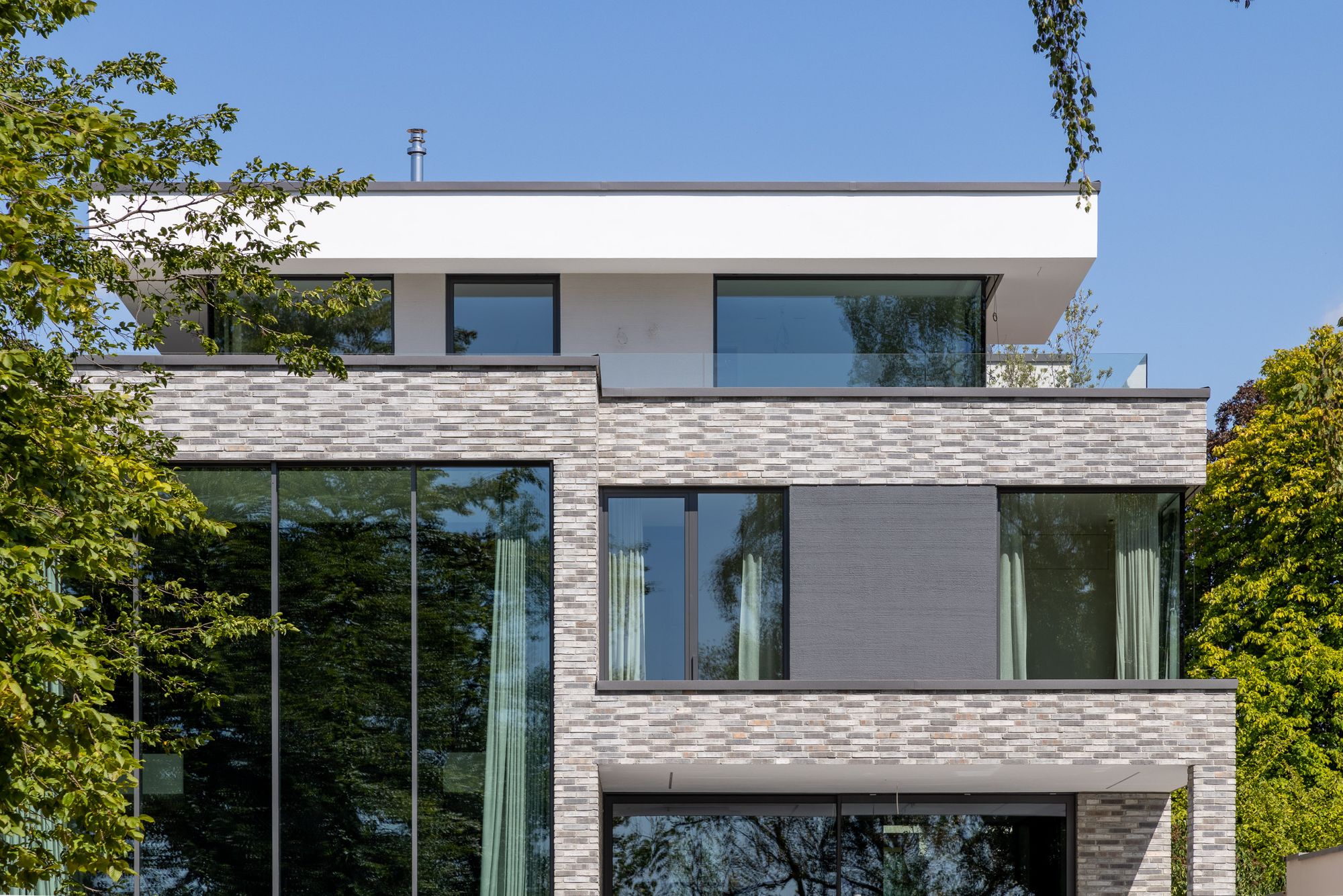 Fassade in Klinker-Riemchen und Putz